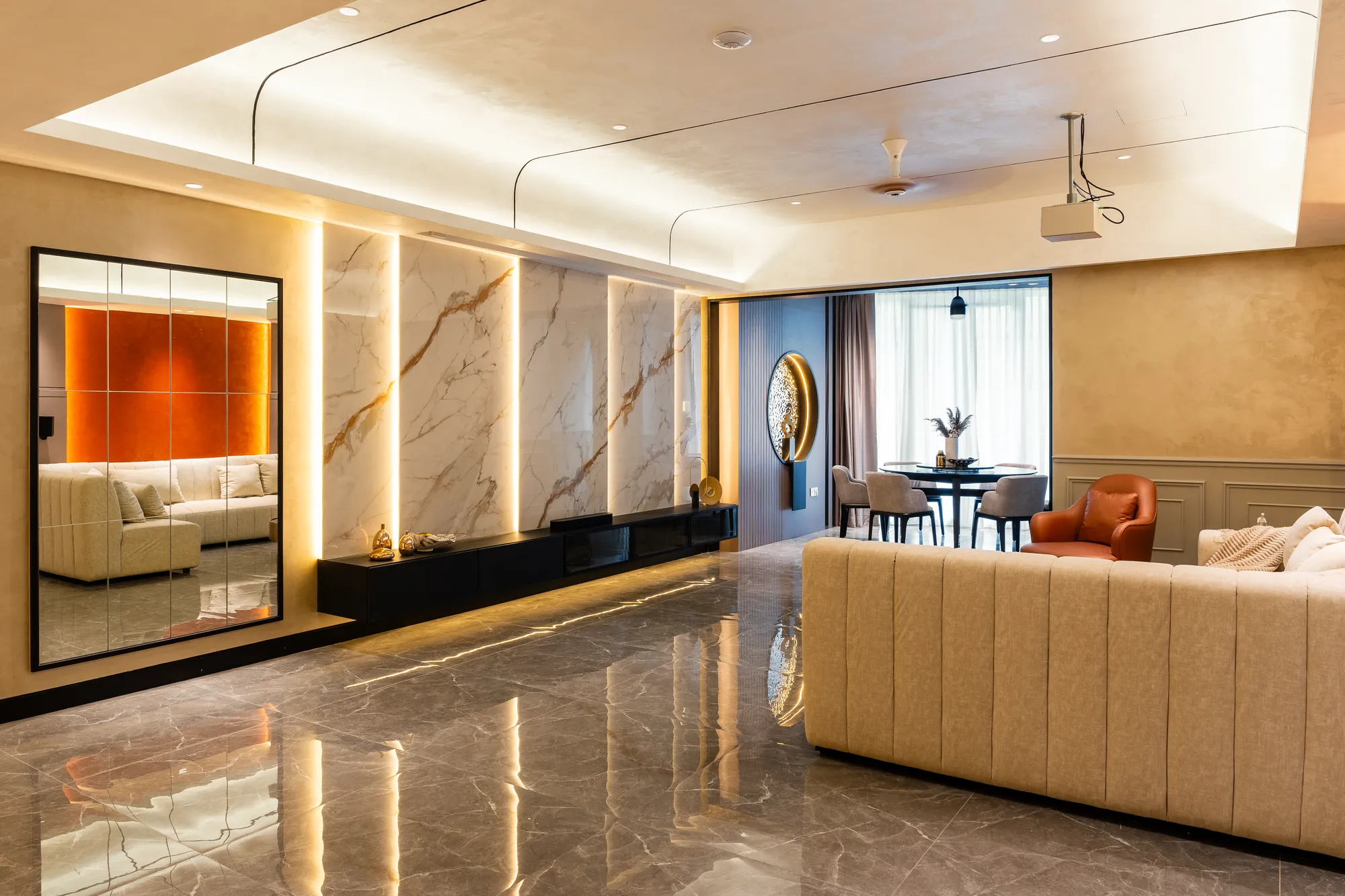 Living room with book-matched marble feature wall, Kirana Residence, Kuala Lumpur